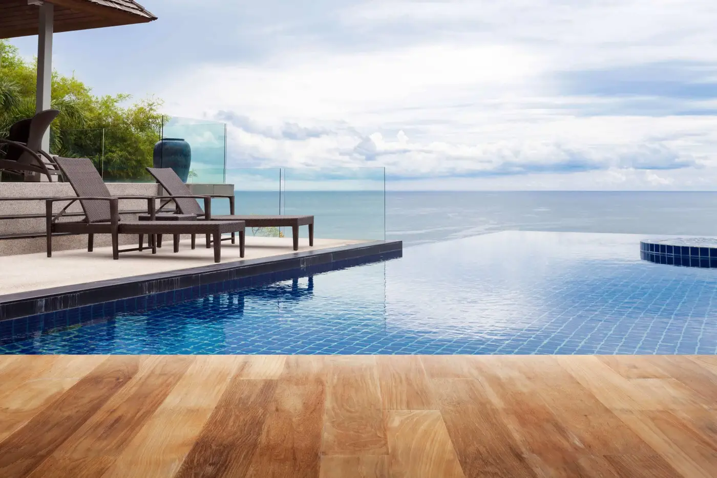Glass pool safety fence around a non-shared backyard pool